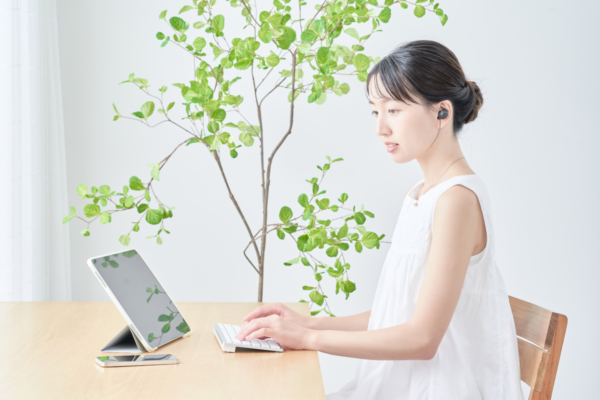 young woman using tablet PC